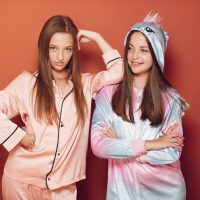 two-little-girls-cute-pajamas_1157-25562